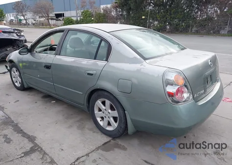 2002 Nissan Altima 2.5 S из США, поврежденный, VIN 1N4AL11D82C197008